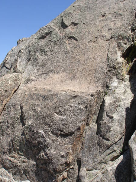 The left side of Skyy Slab.  Skyy Pilot (5.9) starts in the middle and works up and right through good edges, continuing up the right side of the slab.