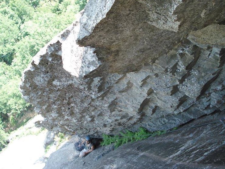 Looking down from the exposed roof traverse.... Check out the cool, weird rock, the nice belay ledge, and the exposure.... I took this picture from a good stem just after entering the roof traverse....