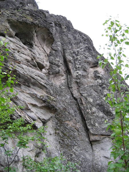 North Buttress Crack 5.9; found on the North aspect of the Main Rock formation.