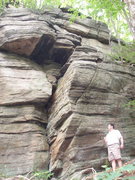 Whoops ascends the obvious dihedral, and then the overhang above at its wides point.  Bryan MacDonald, on the right.