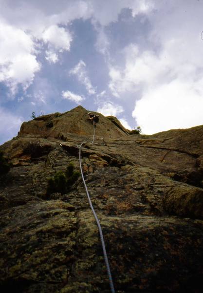 Charles Vernon on the crux headwall during the first ascent of the Southwest Prow, The Colossus. Poor picture quality is due to the slide being scanned on a cheap scanner.