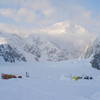 Advanced Base Camp, 6,800 feet, and the view up the Northeast Fork of the Kahiltna Glacier with the west side of Denali in the background.