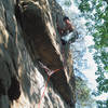 Tracy Brandt leading above the roof crux. August, 2003.