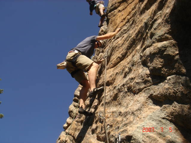 Adam climbing near the third bolt.