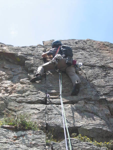 Mike Amato going up the steep, short  crack on pitch 7.