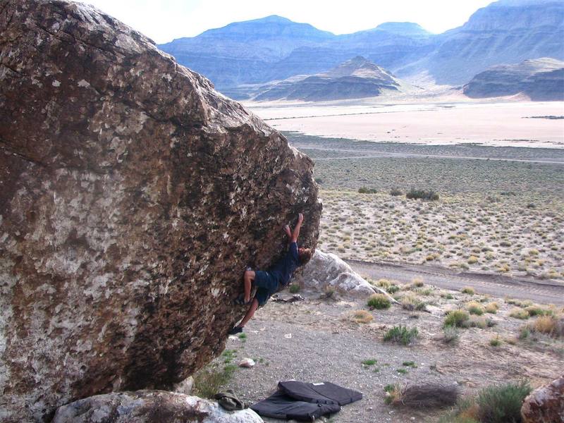 This is a V5 just left of uber classic Topus Arete (also V5). There is a V6 variation to the pictured problem which eliminates the seam I am into in the photo. Left of this line is a tall V8 Sharma put up a while back.  