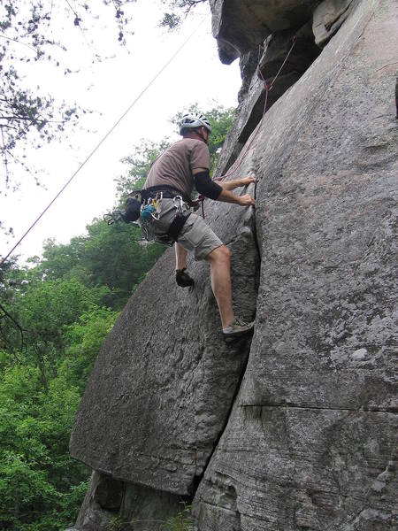 Tom O. moves up the lower section of Bill's Route, heading for the squeeze slot in the roof.