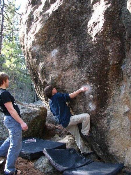 Chase Gardner sticking the first move. The right hand start hold is by his knee. He later did this problem.