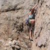 Deb climbing the lower portion of Gold Bug (5.8), Holcomb Valley Pinnacles