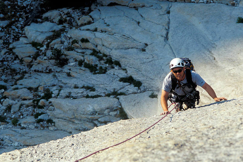 Matt Grieger stands at the bolt that marks the start of the 5.8 runout on pitch 2.