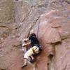 Starting the traverse over the arete on Northcutt Start.