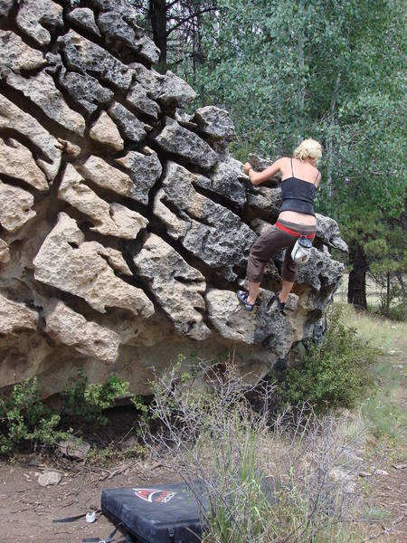 Megan working up the puzzle boulder, very cool boulder and tons of fun to cool down or warm up on.