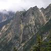 Petit du Cheval is the formation on the left and 5.8 route named Spontaneity Ridge follows the right edge of the formation just left of the rock slide gully (8/04). 