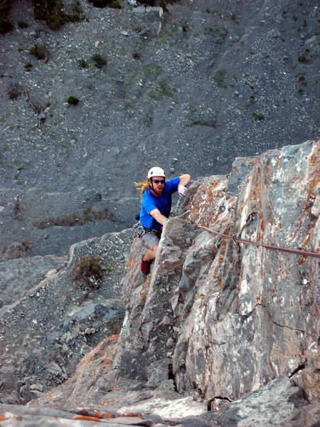 Drew on, what we dubbed the 'Murder Pitch', p4.  It is steeeeeeep....and exposed!  This is the best pitch of climbing IMO--still loose but awesome moves and great, great, great exposure.<br>
Those trees are pretty much 300' straight below you! This pitch is mostly .10+ with a .11a or .b crux--well protected.