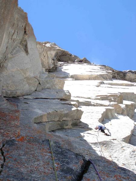 Looking up the first pitch of Cannonball Corner, with the entire route above. The last hard lead pulls the big roofs at the rim, straight above Dave's head. 