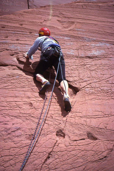 Moki Steps at the start of the Round Rock Climb.  Climber Brian Povolny.  Photo;  Todd Gordon