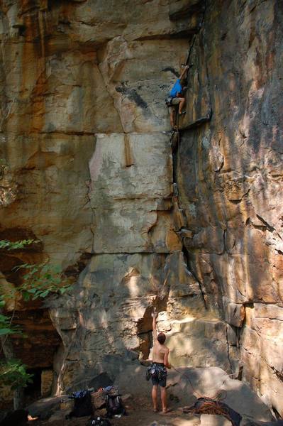 Michael Martin reaches through the crux.