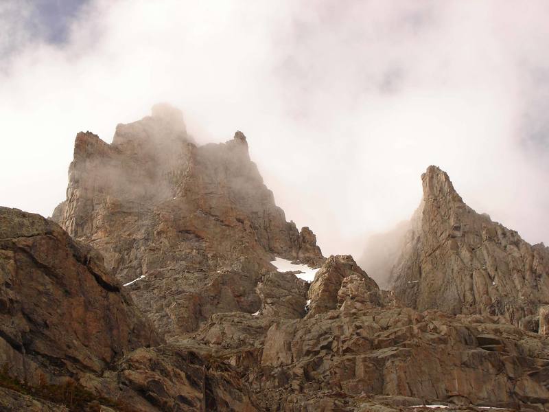 The two rock buttresses of Shoshoni Peak (June 2007). The Dieckhoff-Lowe Route (5.10+) and an unknown 5.9 ascend the left skyline of the left buttress. A new route, Mass Wasting, follows the obvious steep corner system to the top of the right buttress.