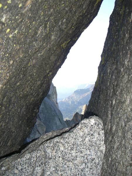 The Hole on East Ridge route of Wolf's Head.  A tight squeeze through this one.