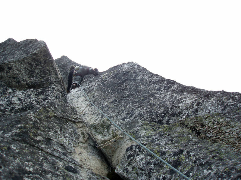 Crux pitch of "Superkancie" (Super Edge) on the northeast face of Mnich.