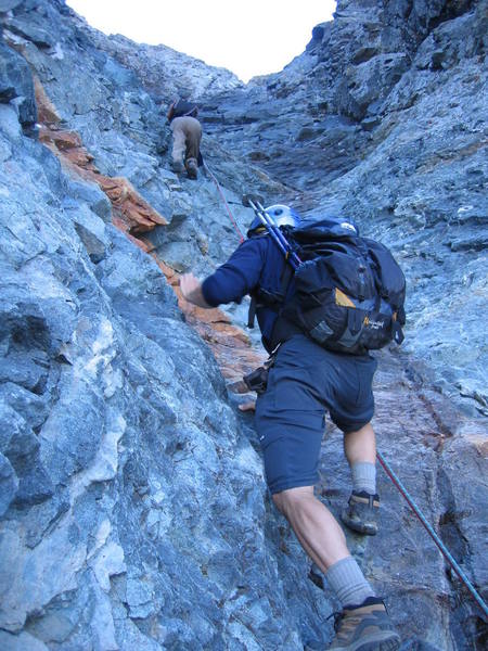 Kurt and Martin carefully avoiding the fixed ropes, and nearing the narrowest and hardest section of the couloir.