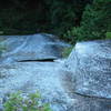 Looking down from the second belay.  The second pitch corner is shown and the alternate start to the first pitch is visible as a scrubbed line that comes in from the right.