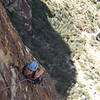 A little perspective near the top of pitch one: "Wow, I'm tired, partner! Maybe a little chalk right now will give me back my climbing powers!" <br>
<br>
May 2007<br>
Photo by J. Lee