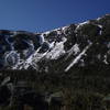 The right side of the ravine headwall in a low snow year. Great Gully is the large one in the center. Other potential climbs are seen to the right.