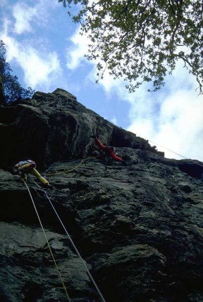 Simon high on the 2nd pitch of Warfarin, 5.10c (E2 5c).