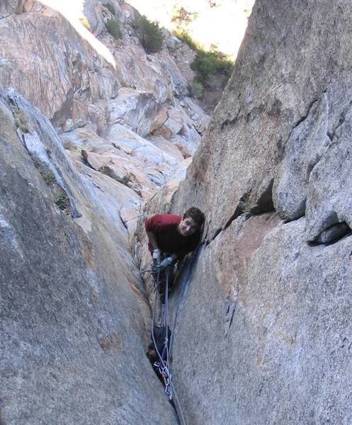 Belay at the top of pitch 6. There is a small ledge on the left signaling that it is time to let your partner start  groveling. 