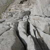 Half way up pitch three. The flutted cracks are shown here. Above this are the bear hug cracks.