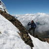  Nancy Bell contemplates the unexpected snow on Illiniza Norte.