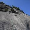 Dave Trumper leading up from the Quartz Pocket on pitch 3... bring tricams for this pitch if you like protection...