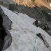 Nancy Bell heads left underneath a large block near the top of East Couloir, 8-1-2007.