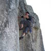 Bryce Martin cranking his way up an overhung 5.11 corner crack at Whanganui Bay.  Not bad for a 55yr old... (this climb spat me off twice on toprope)