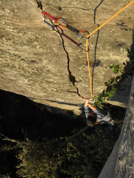 Natalie following me up Sayonara (5.8), a beautiful straight-in hand and finger crack at Whanganui Bay.