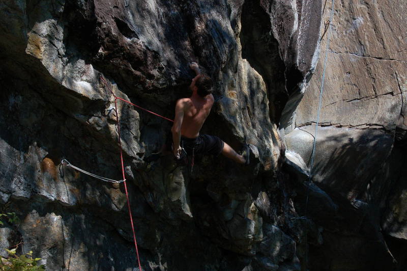 Ladd Raine trying to chalk and rest before the crux deadpoint on this great line.