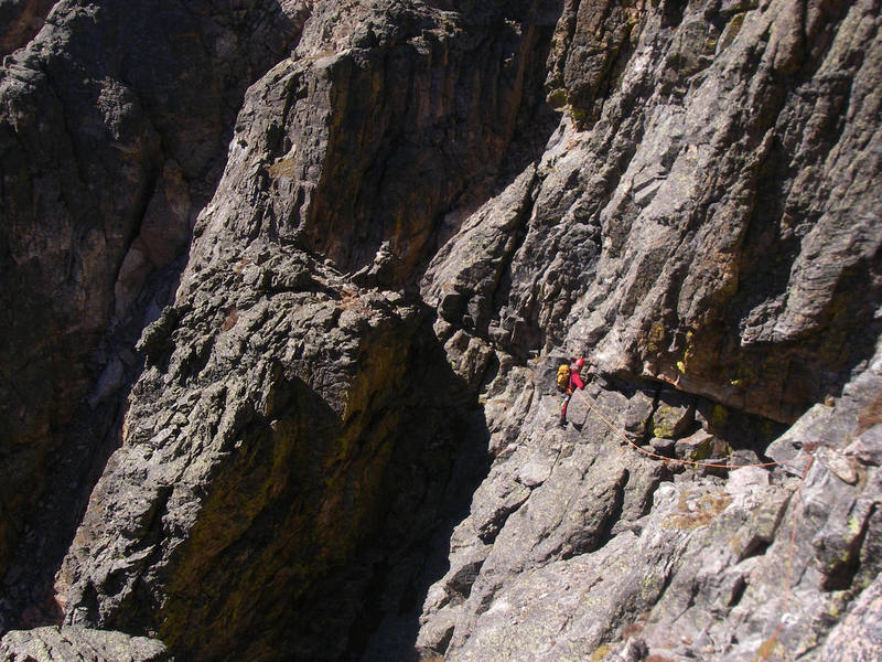 Traversing off the west side of Notchtop. Paul is leading out the first traversing pitch after having come over the summit of Notchtop. 9-22-07.