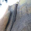 This is the line visible from below.  It is a lot wider than it looks from the belay.  