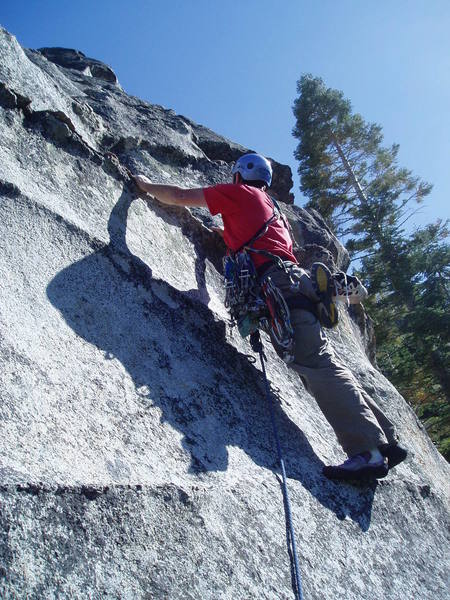 The hardest move on P2 is this awkward first move right off of the belay where you have to struggle a bit to stand on the high dike.