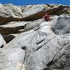 Just below the upper crux of Mantle Marathon (5.10a), Riverside Quarry 