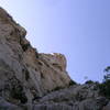 A look up at the line from low down. The next pitches continue up the right skyline "arete" to the Thumb Summit block.