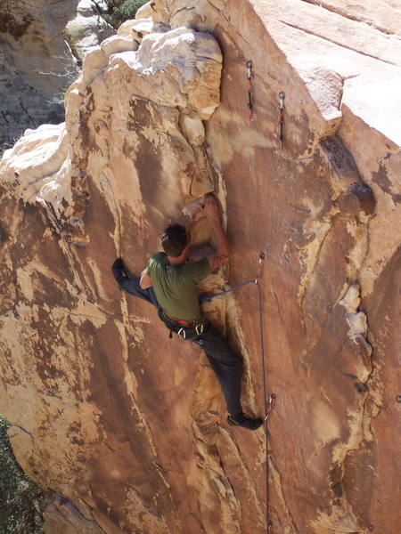 Kentucky Pete on an early ascent of Choking Smokers.