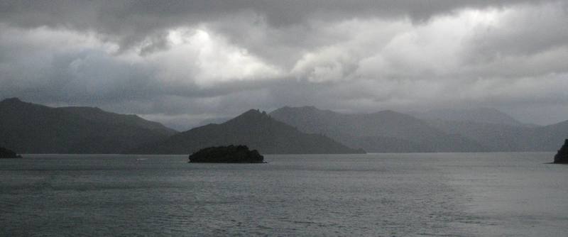 The South Island finally emerges from the mist after a long ferry ride across Cook's Strait - one of the most dangerous stretches of open water in the world.  This is Marlborough Sound on the northeast end of the South Island.