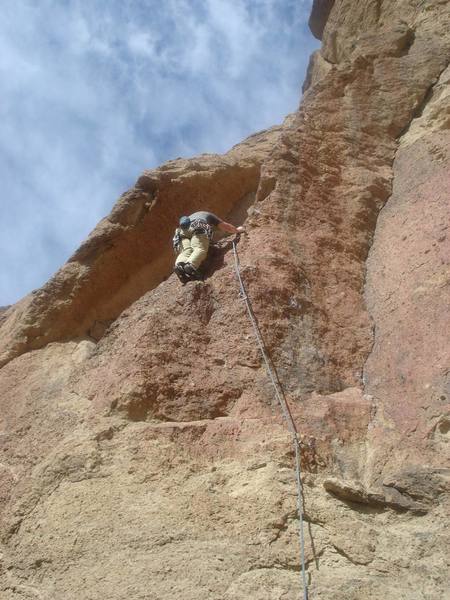 KevinM through the crux and ready to ascend the ramp to the anchors (hidden from this view by the arete).