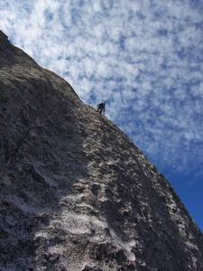 Climber midway on P3.