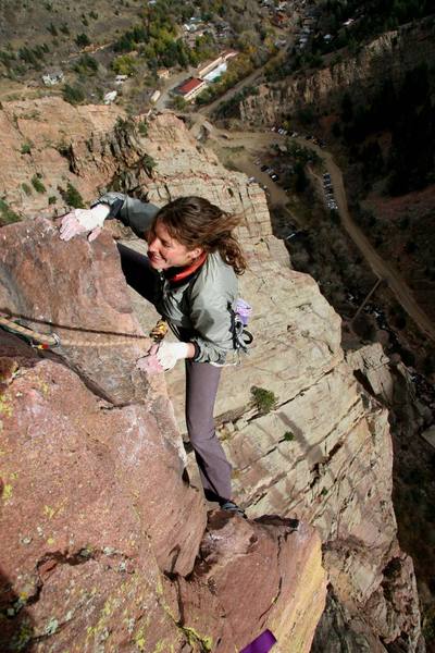 AJ rounding the arete on the last pitch of the Naked Edge