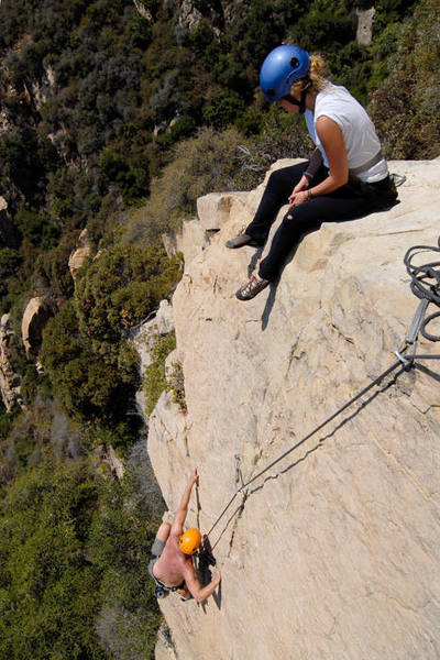 Ari Levine looks on as Dad, Bruce, nears the top of "the Rapture" at Lower Gibraltar.