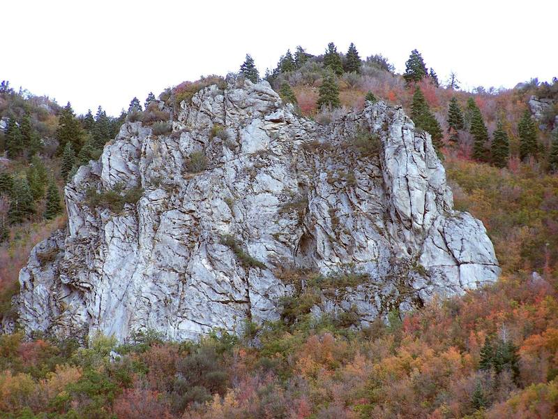 The Native American Crag surrounded by fall foliage.