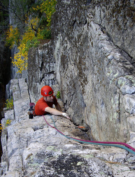 Pitch 3, just above the 5.9 roof. 5.8 hand cracks of Pitch 2 visible below.